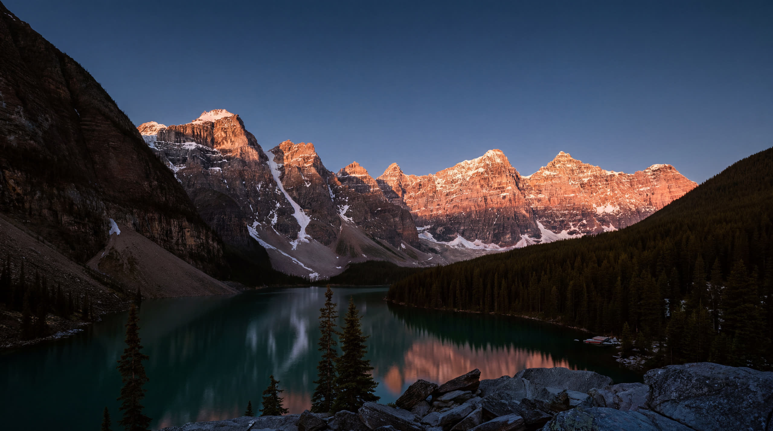 First light touching the Ten Peaks over Moraine Lake
